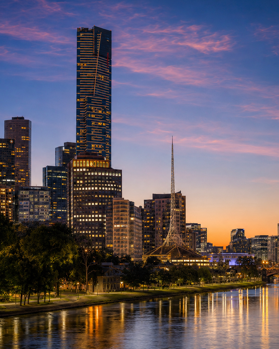 Melbourne CBD skyline at twilight featuring Eureka Tower, Arts Centre Spire, and the Yarra River.
